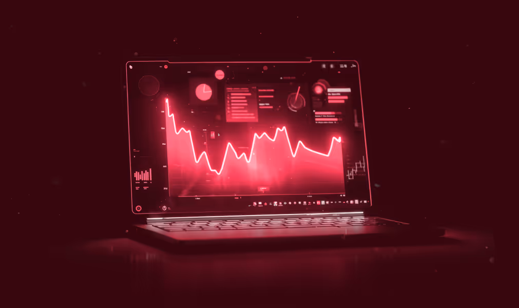 Graphiques financiers en direct sur un ordinateur portable, montrant l'évolution des cours pour le trading
